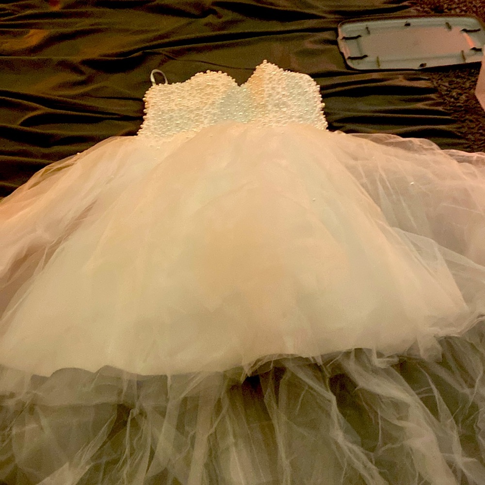 White strapless gown with pearls on top